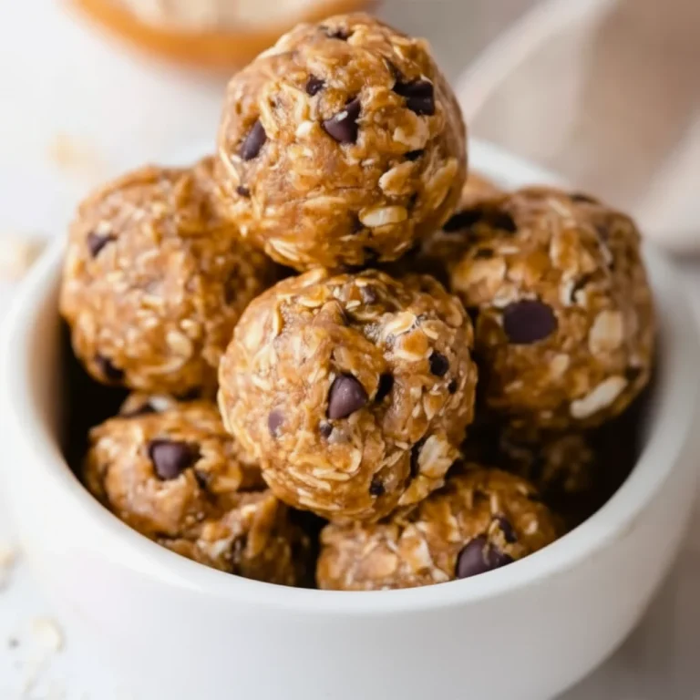 Homemade no bake oatmeal protein balls on a wooden table.