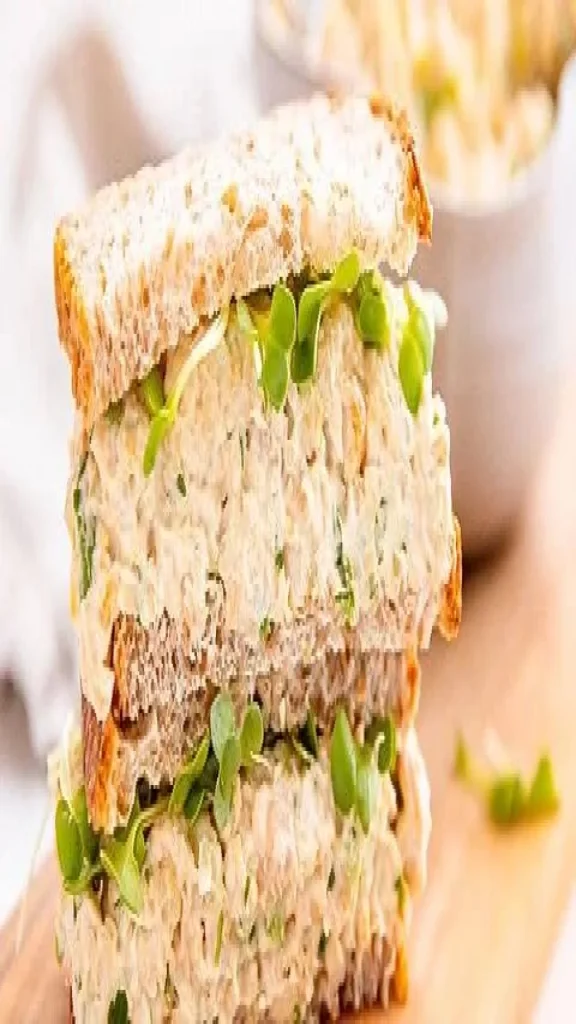 Chickpea Salad Sandwich with fresh vegetables and herbs.