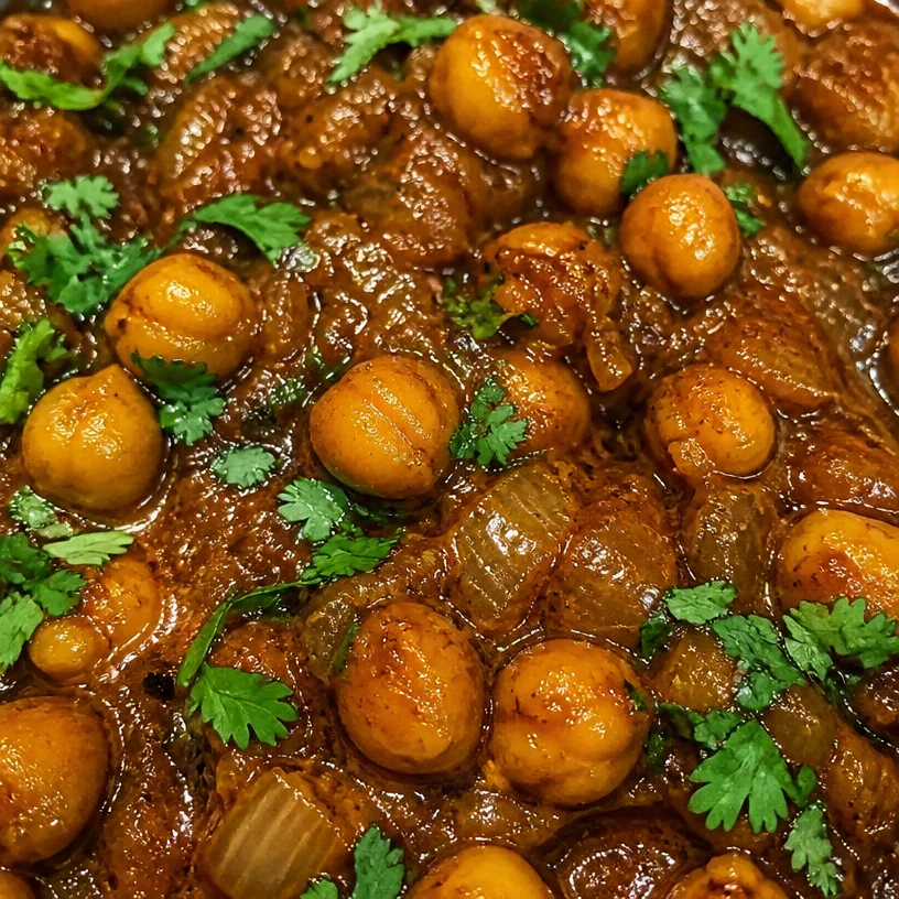 Delicious Butter Chickpeas served in a bowl with spices and herbs